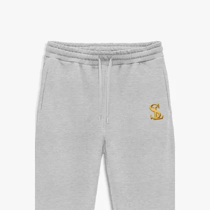 Tepláky Jogger , Barva Šedá, s Potiskem Logo Lucazz