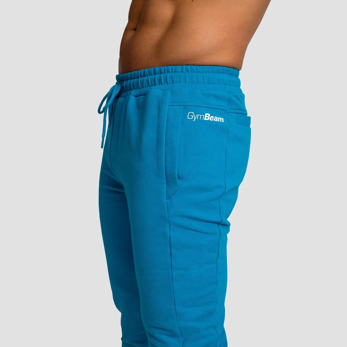 GymBeam Tepláky Limitless Aquamarine - Barva: modrá | Hmotnost: 0,683 kg | Balení: 28 · záber 2