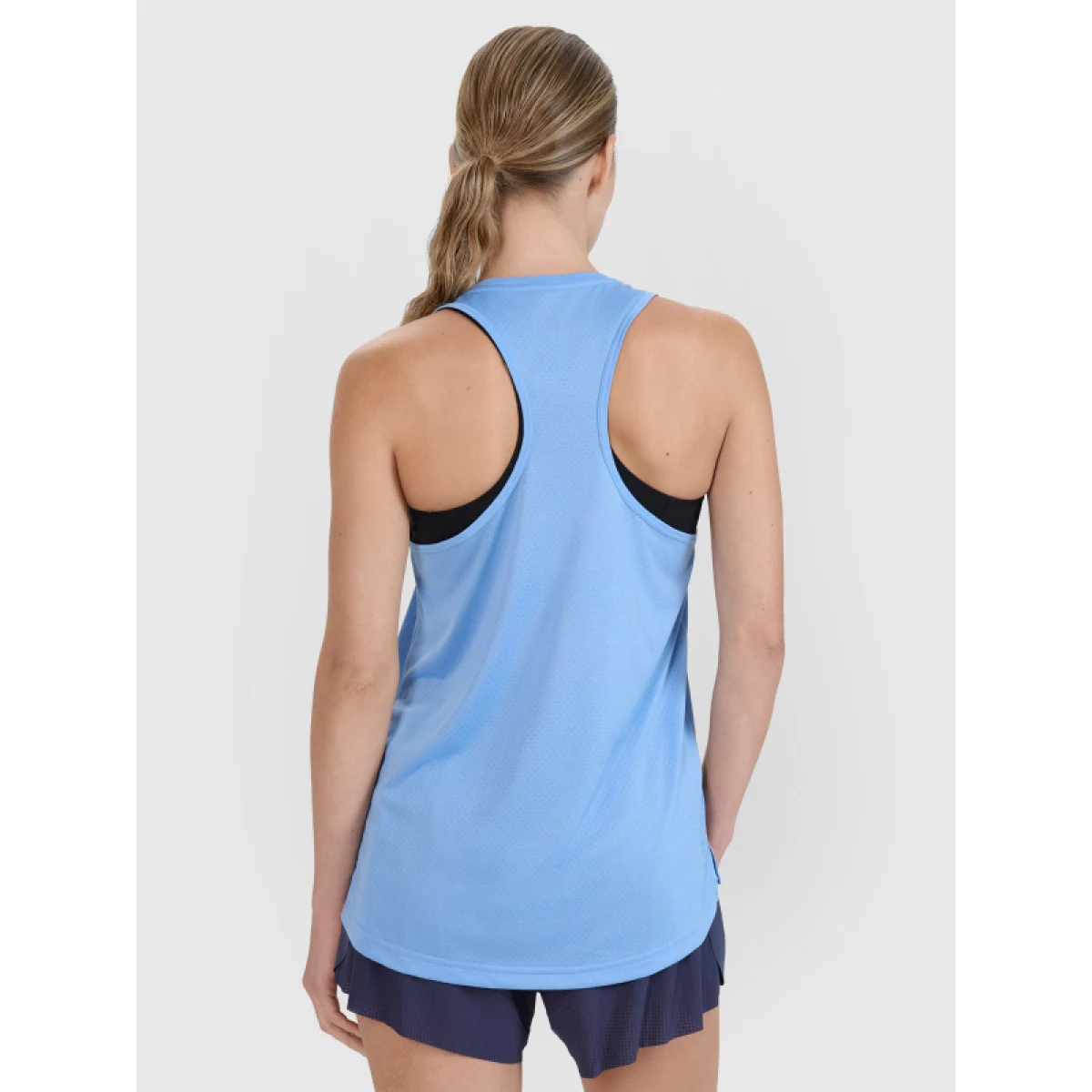 Dámské běžecké tričko bez rukávů 4F SLEEVELESS FNK-WSS25TFSLF427-33S-BLUE · záber 4