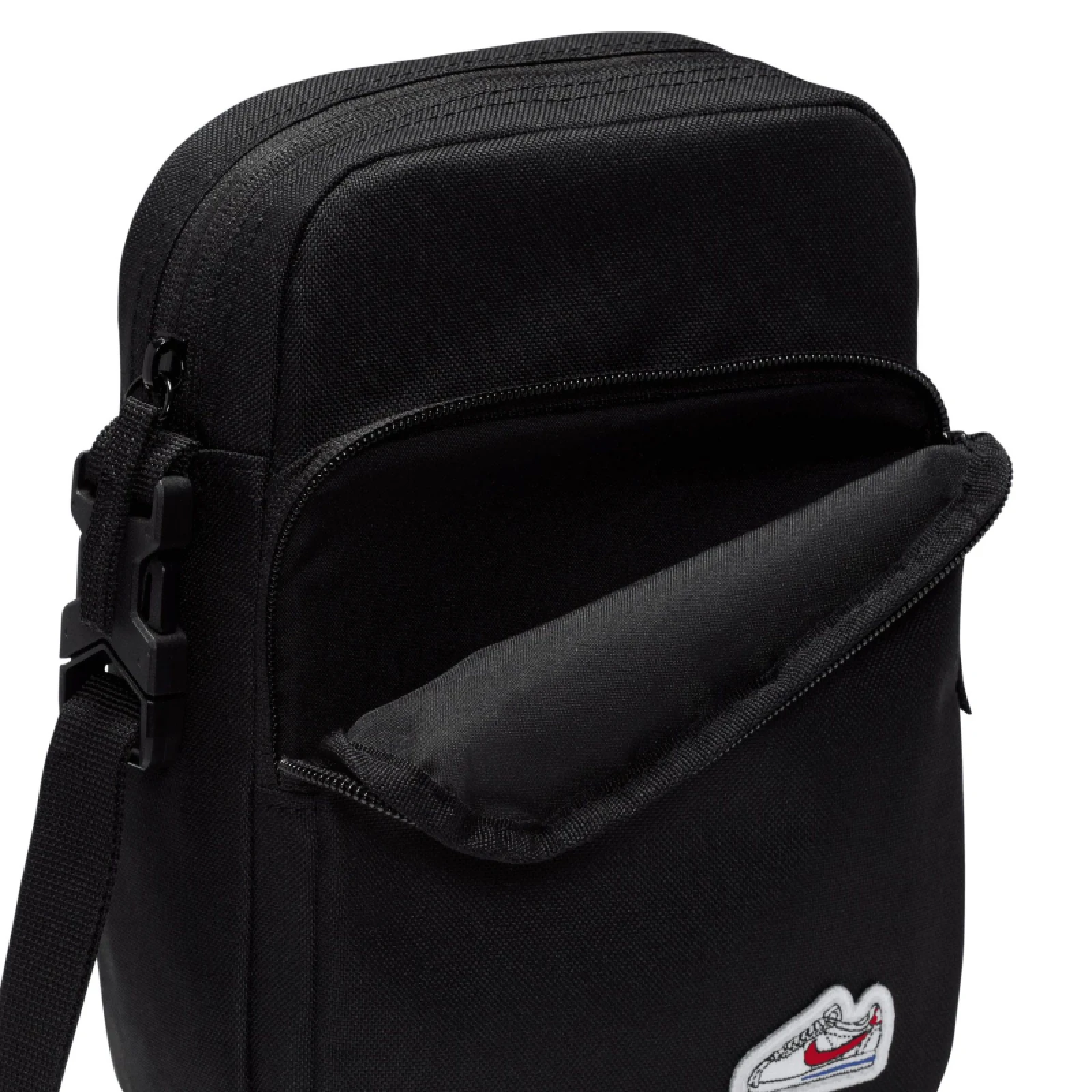 Malá taška přes rameno NIKE NK HRTGE CRSSBY - CORTEZ PTCH · záber 3