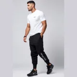 Tepláky Jogger , Barva Modrá, s Potiskem Self Made Man · záber 5