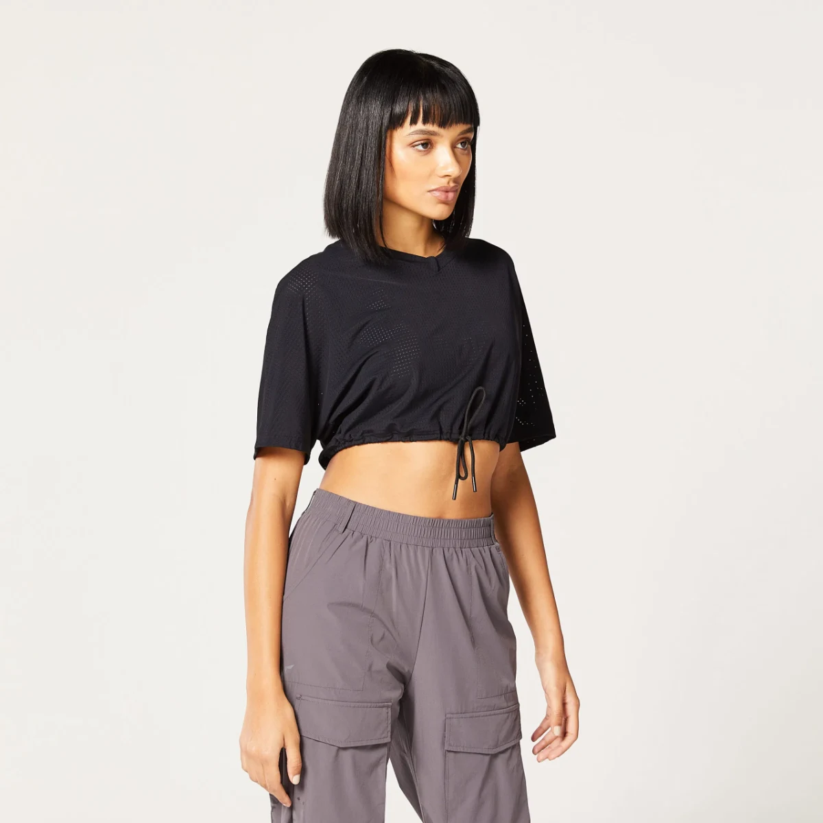 SQUATWOLF Code V-nyakú női haspóló Black - Méret: L | Pohlavie: Női | Vek: Felnőtt | Tömeg: 0,18 g | Csomag: 100 · záber 5