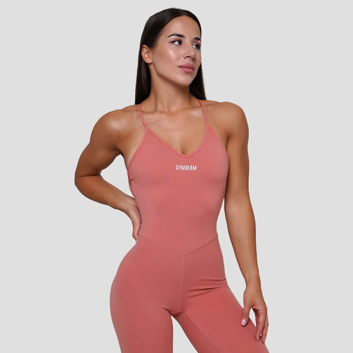 GymBeam Women‘s FIT Bodysuit Salmon - Rozmiar: M | Kolor: Różowy | Waga: 0,229 g | Opakowanie: 70 · záber 1