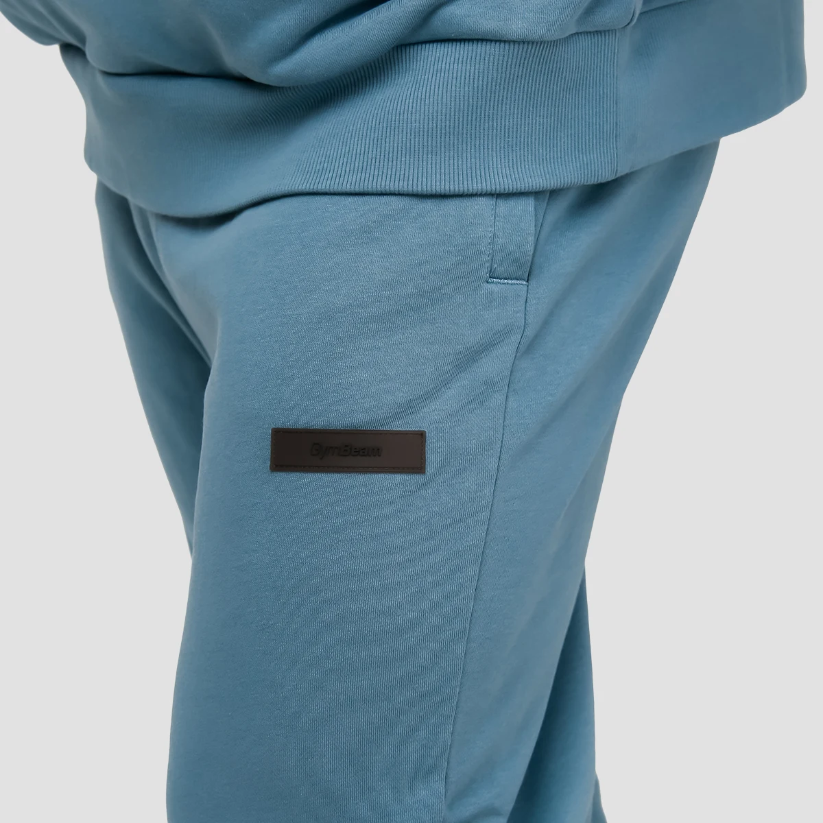 GymBeam Unity Joggers Blue - Rozmiar: S | Kolor: Niebieski | Waga: 0,51 g · záber 2