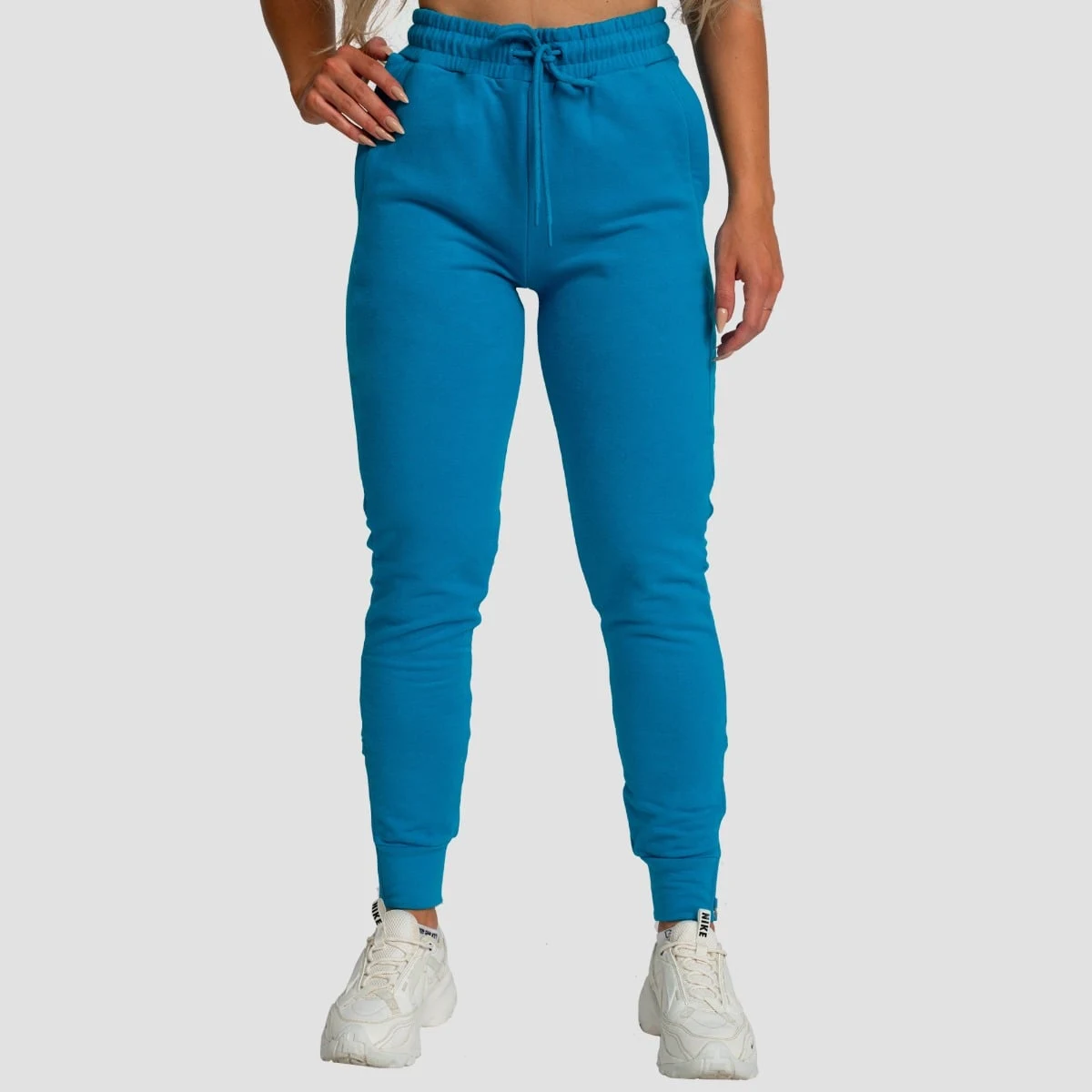 GymBeam Women‘s Limitless Joggers Aquamarine - Rozmiar: XS | Kolor: Niebieski | Waga: 0,476 g | Opakowanie: 40 · záber 1