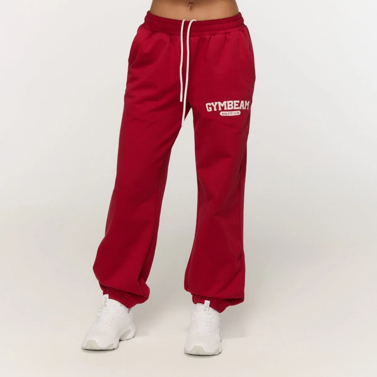 GymBeam Women‘s Varsity Joggers Red - Rozmiar: XS | Kolor: Czerwony | Waga: 0,5806 g | Opakowanie: 20 · záber 1