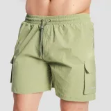 GymBeam Men‘s Swim Cargo Shorts Olive - Rozmiar: XXL | Kolor: Zielony | Waga: 0,197 g · záber 1