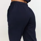 GymBeam Women‘s Varsity Joggers Blue - Rozmiar: XL | Kolor: Niebieski | Waga: 0,7034 g | Opakowanie: 16 · záber 4