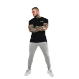GymBeam Spodnie dresowe Slimfit Grey - Rozmiar: XXL | Vek: Dorośli | Waga: 0,44 g | Opakowanie: 40 · záber 4