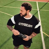GymBeam Varsity Shorts Black - Rozmiar: M | Kolor: Czarny | Waga: 0,155 g | Opakowanie: 100 · záber 2