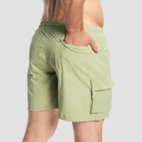 GymBeam Men‘s Swim Cargo Shorts Olive - Rozmiar: XXL | Kolor: Zielony | Waga: 0,197 g · záber 4