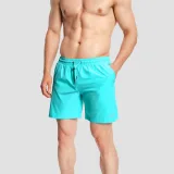 GymBeam Men‘s Swim Shorts Lagoon - Rozmiar: L | Kolor: Niebieski | Waga: 0,184 g · záber 4