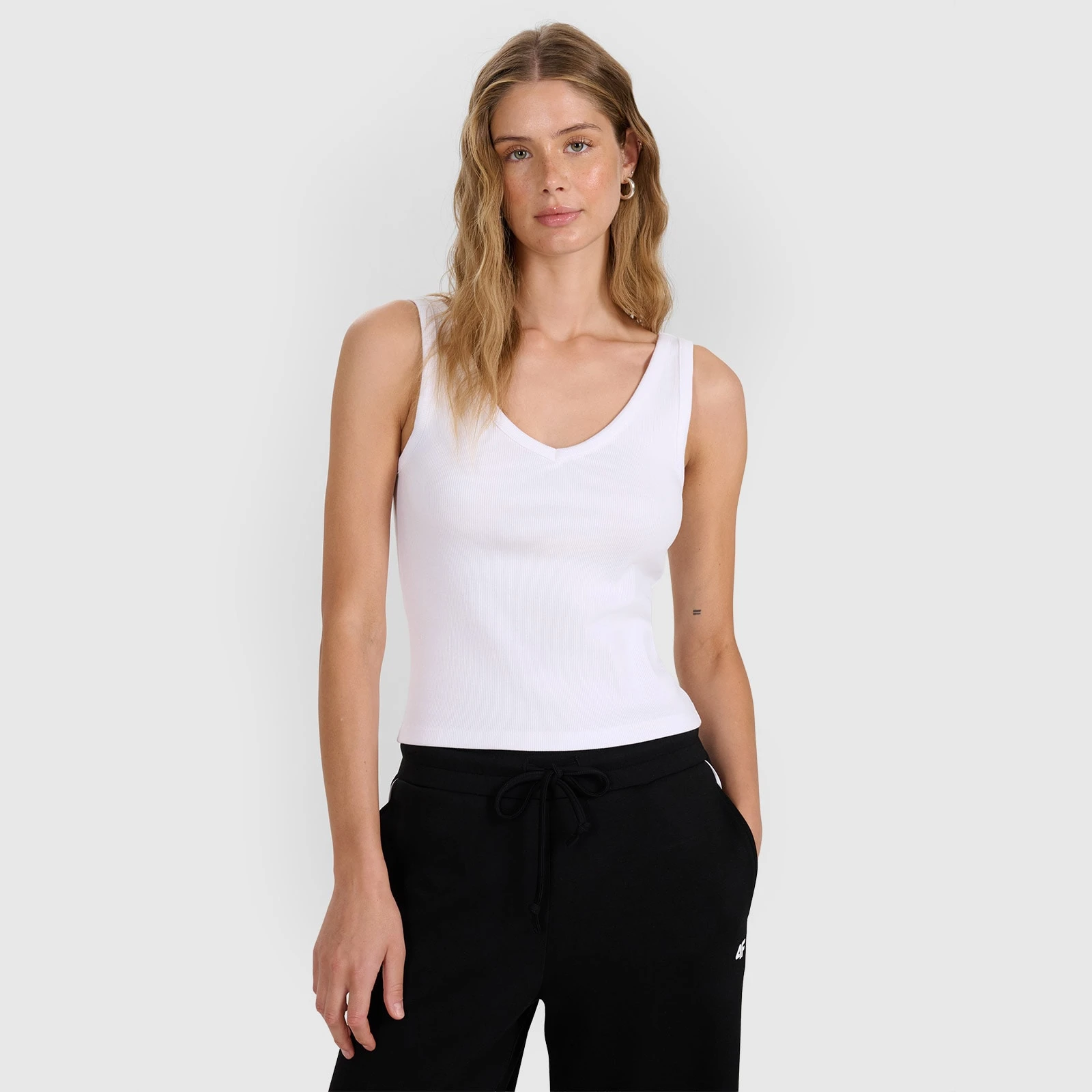Dámsky slim top z rebrovanej pleteniny - biely · záber 1