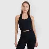 Dámsky slim crop-top bez potlače 4F x Anna Lewandowska - čierny · záber 1