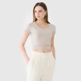 Dámske crop top tričko bez potlače - béžové · záber 1