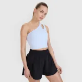 Tréningový crop top na jedno rameno 4F x Anna Lewandowska - modrý · záber 1