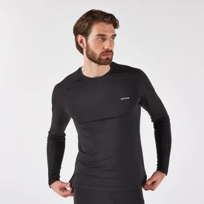 KIPRUN Pánske bežecké hrejivé tričko Run 500 bezšvové čierne M