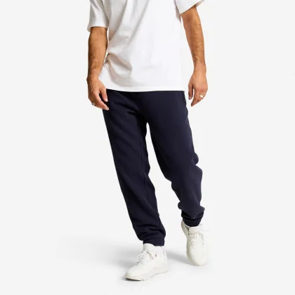 DOMYOS Pánske hrejivé tepláky 500 tmavomodré 2XL (W43 L34)