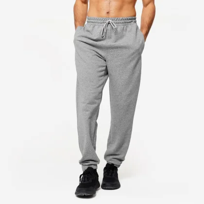 DOMYOS Pánske nohavice 500 Essentials na fitness sivé L (W34 L34)