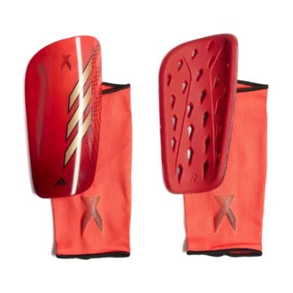Futbalový chránič ADIDAS X SG LGE SOLRED GOLDMT BETSCA