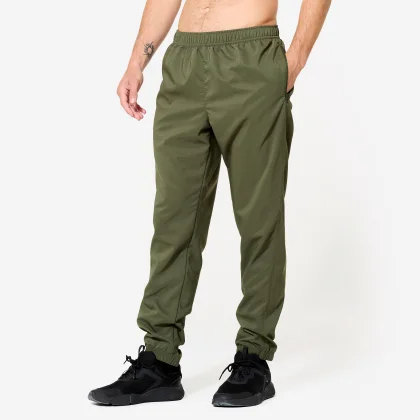 DOMYOS Pánske priedušné fitness tepláky kaki zelené M (W32 L33)