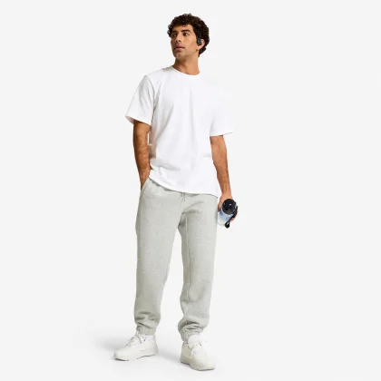 DOMYOS Pánske fitness tepláky hrejivé sivé 3XL (W48 L34)