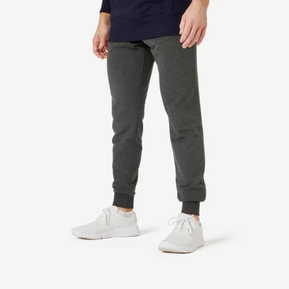 DOMYOS Pánske nohavice 500 slim na fitness tmavosivé XS (W28 L33)