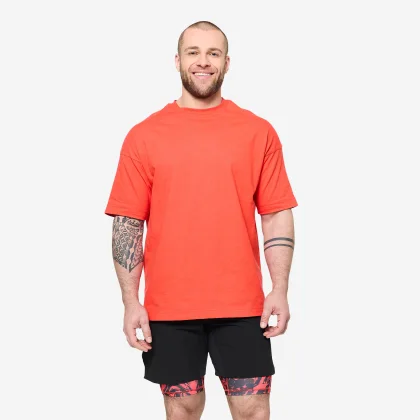 DOMYOS Pánske voľné fitness tričko oranžové L