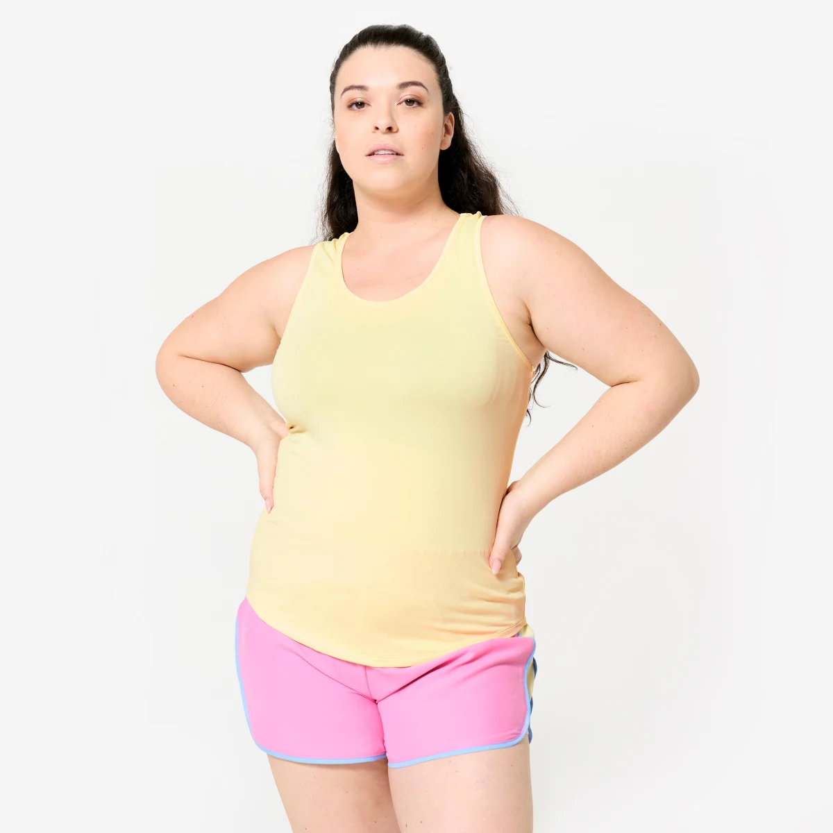 DOMYOS Dámske fitness tielko s plaveckým chrbtom bledožlté L · záber 1