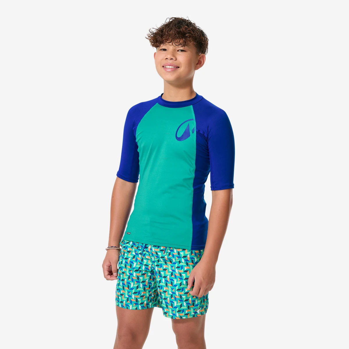 DECATHLON Chlapčenské tričko na surf s UV ochranou 500 zeleno-modré 8-9 r (131-140 cm) · záber 1