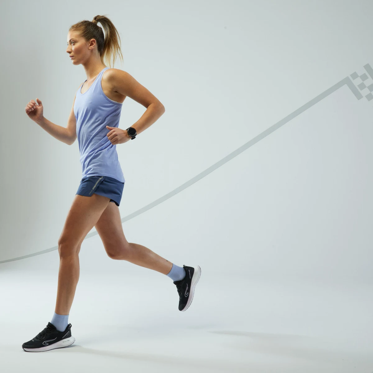 KIPRUN Dámske bežecké tielko Run 500 Confort bez švov levanduľové 2XL · záber 2