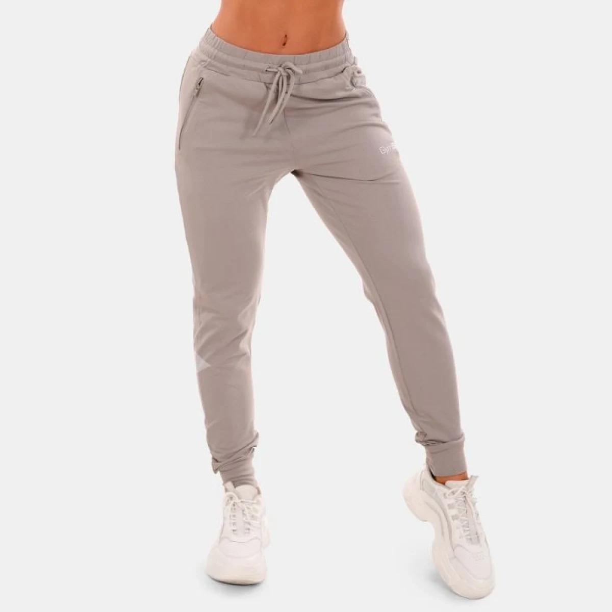 Дамско спортно долнище TRN Grey - GymBeam - Размер: XL | Тегло: 0,43 g | Опаковка: 43 · záber 1