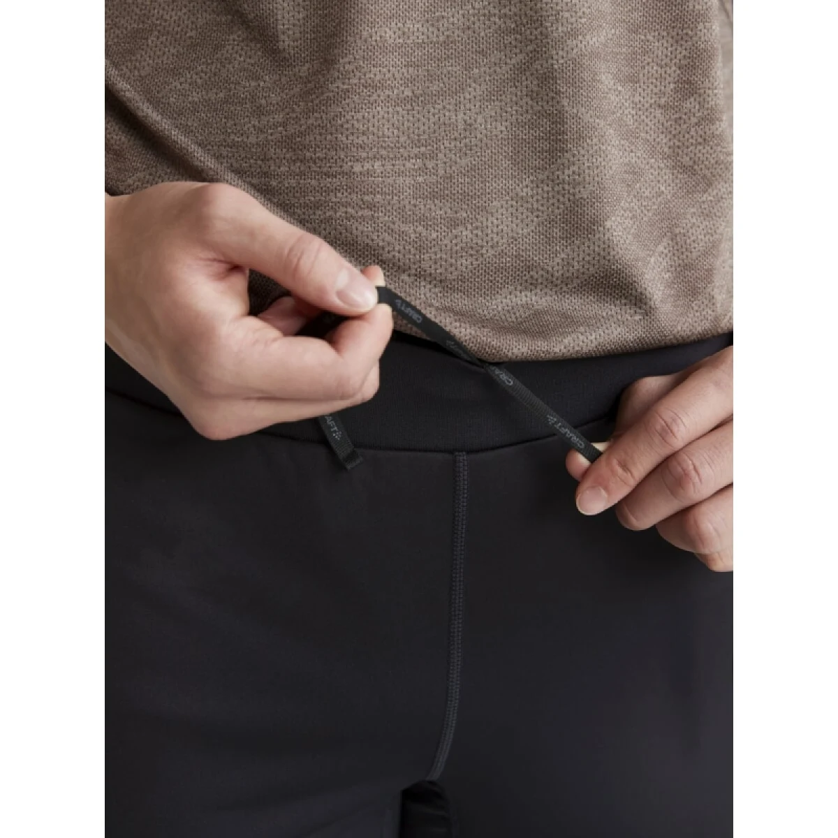 Pánske bežecké nohavice CRAFT ADV ESSENCE WARM WIND TIGHTS 2 M-999000-Black · záber 4