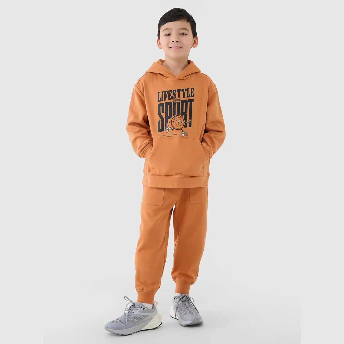 Chlapecké tepláky typu jogger - oranžové · záber 1