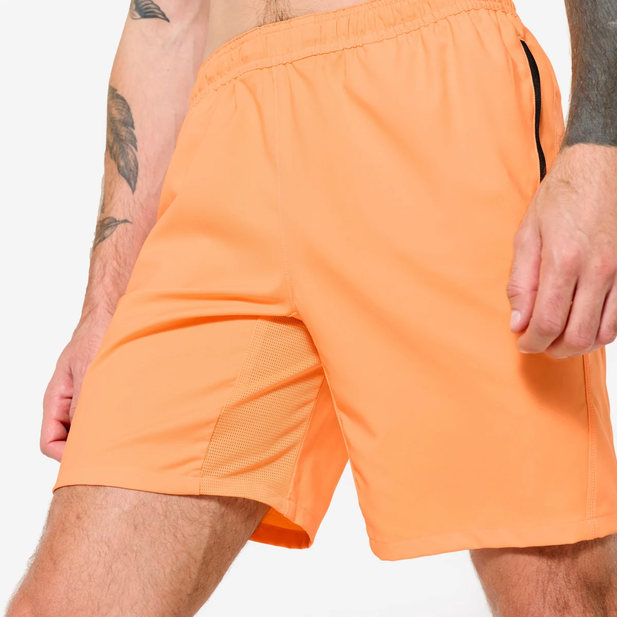 DOMYOS Šortky na fitness s vreckami na zips oranžové 2XL · záber 2