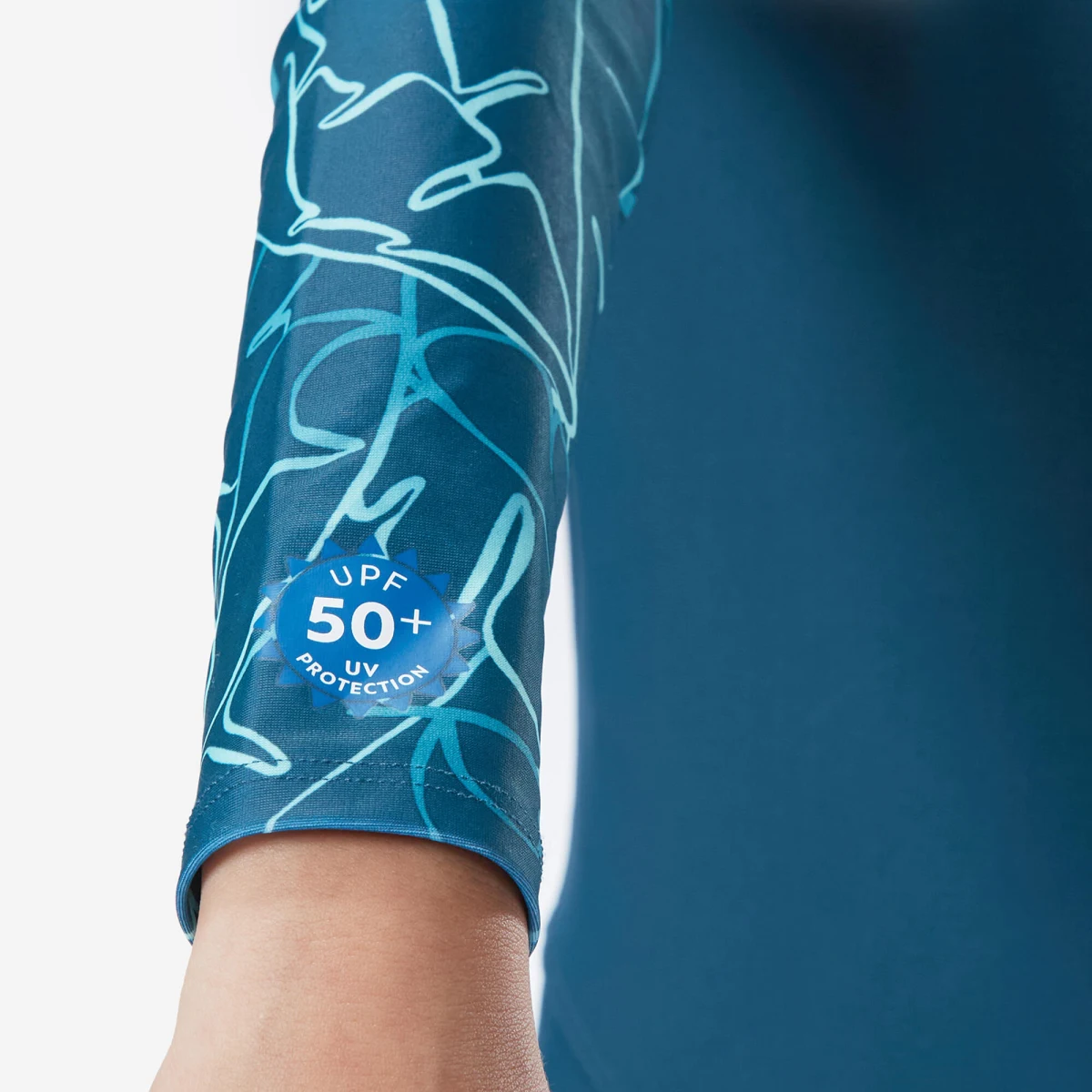 DECATHLON Chlapčenská plavecká kombinéza 100 s dlhými rukávmi a UV ochranou zelená 5-6 r (113-122 cm) · záber 2