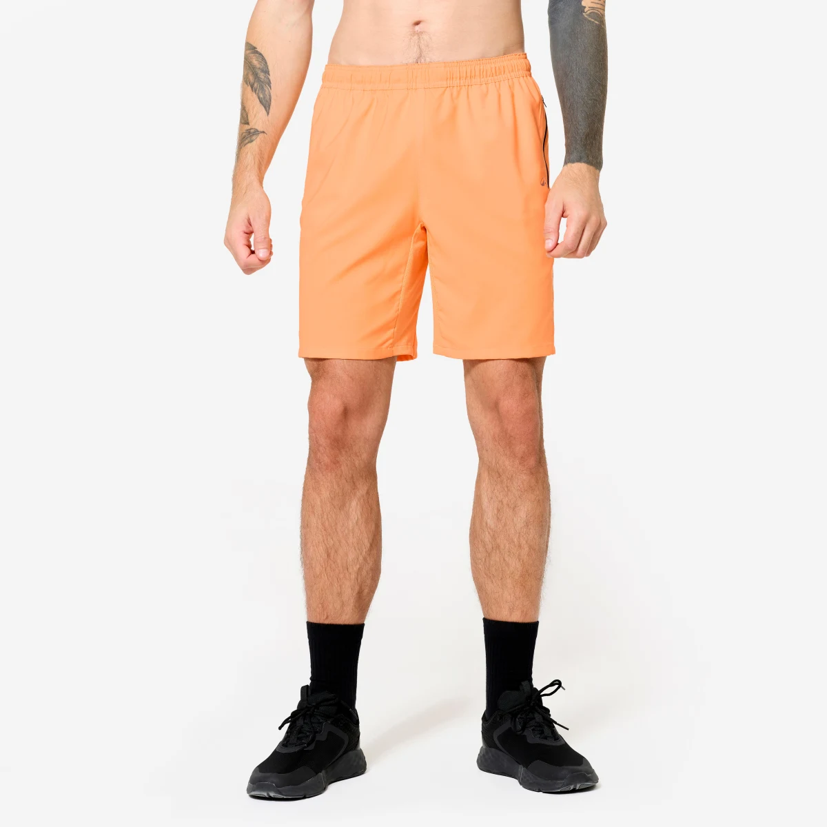 DOMYOS Šortky na fitness s vreckami na zips oranžové 2XL · záber 1