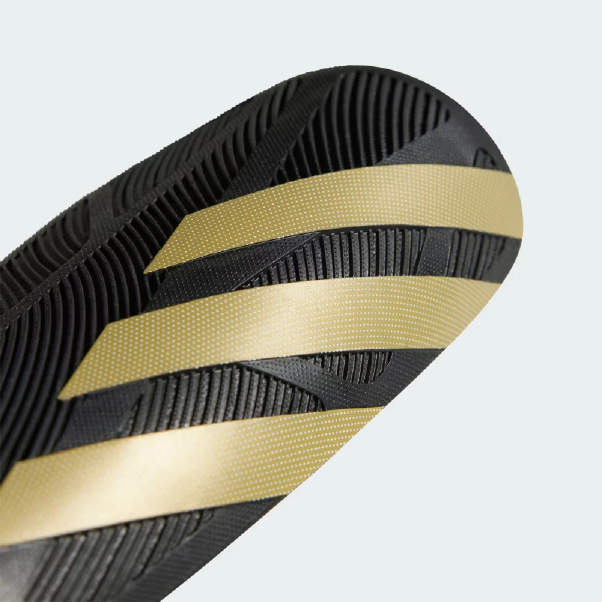 Futbalový chránič ADIDAS TIRO SG COM BLACK GOLDMT WHITE · záber 4