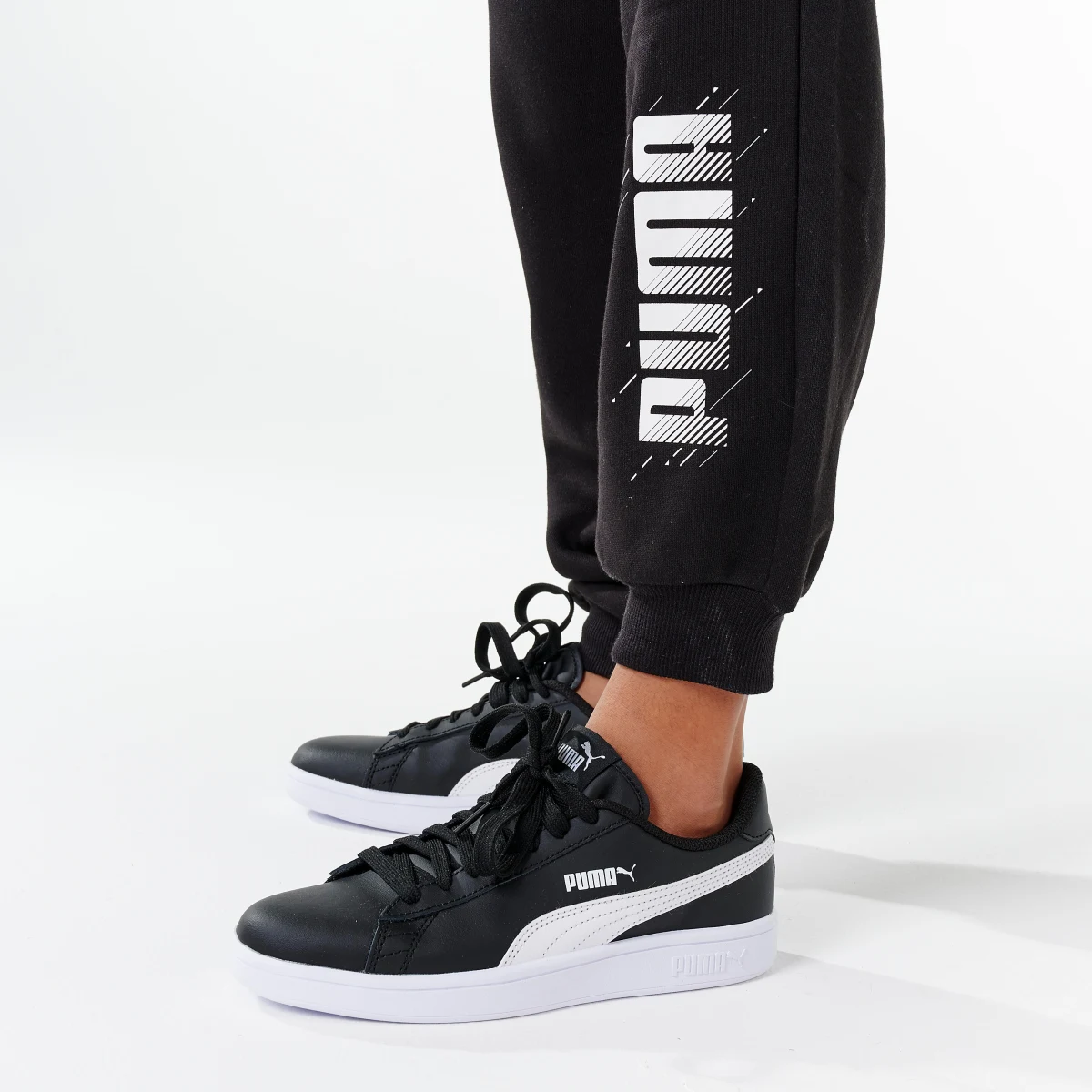PUMA Chlapčenské bežecké nohavice Puma s potlačou čierne 5-6 r (116 cm) · záber 2