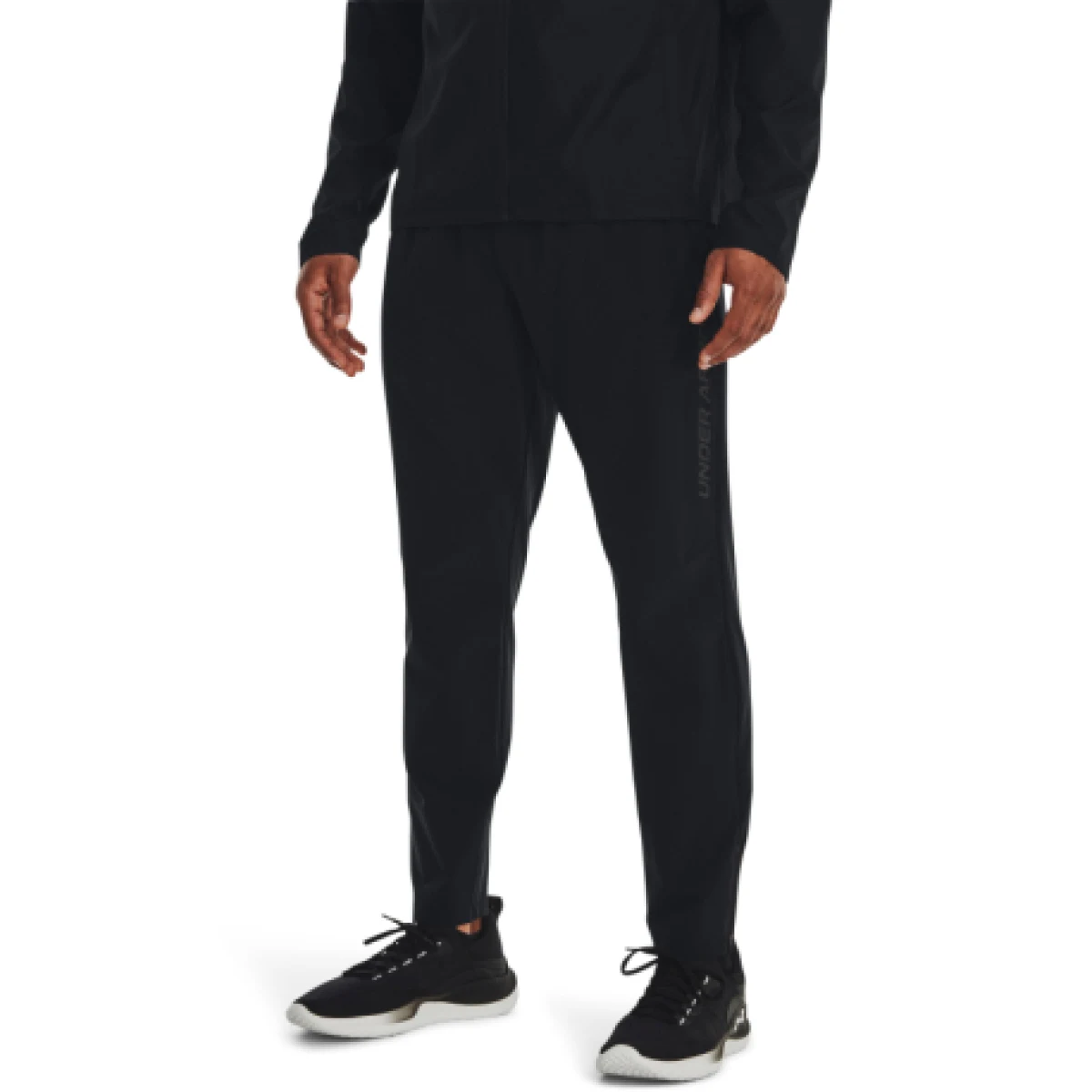 Pánské tréninkové kalhoty UNDER ARMOUR UA STORM RUN PANTS-BLK · záber 1
