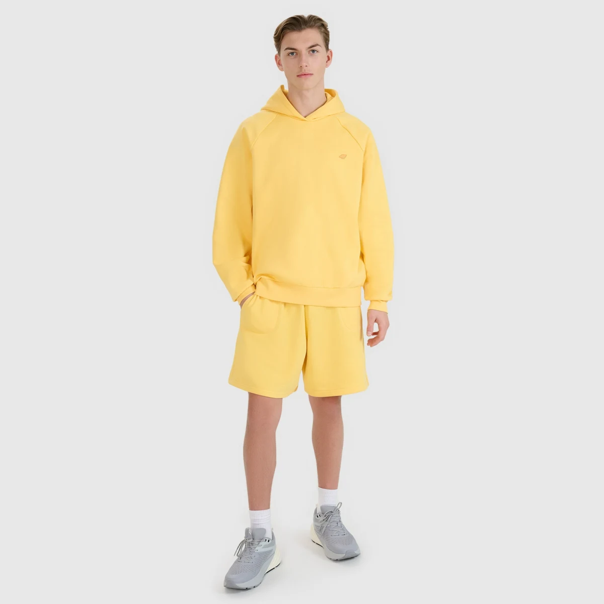 Teplákové šortky unisex - žluté · záber 1