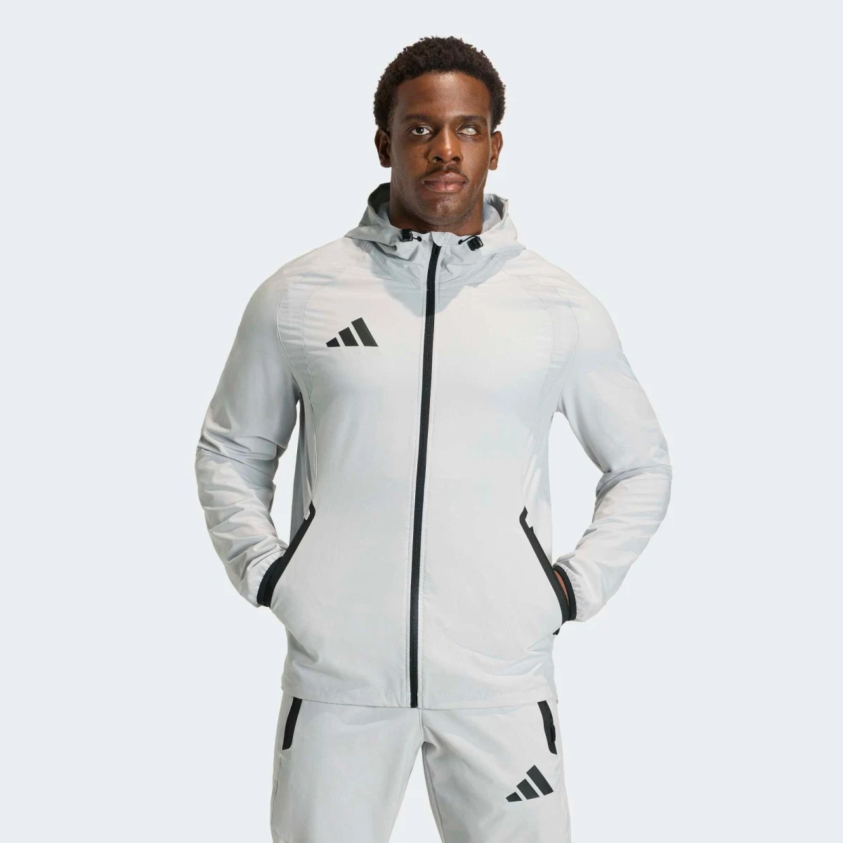 ADIDAS ADIDAS Tiro Travel 26 tréningová bunda sivá S · záber 1