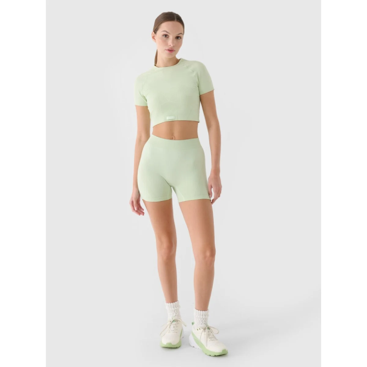 Dámske tréningové kraťasy 4F SHORT TIGHTS FNK F055-RAW24TFSTF055-47S-MINT · záber 2