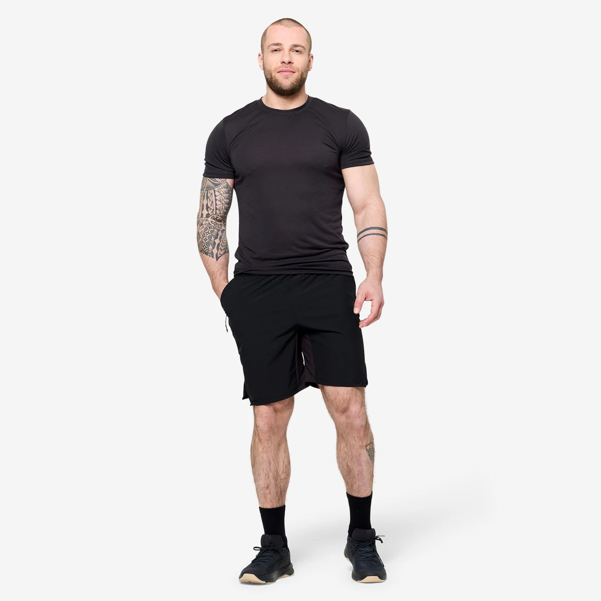 DOMYOS Pánske fitness tričko strih slim čierne M · záber 1