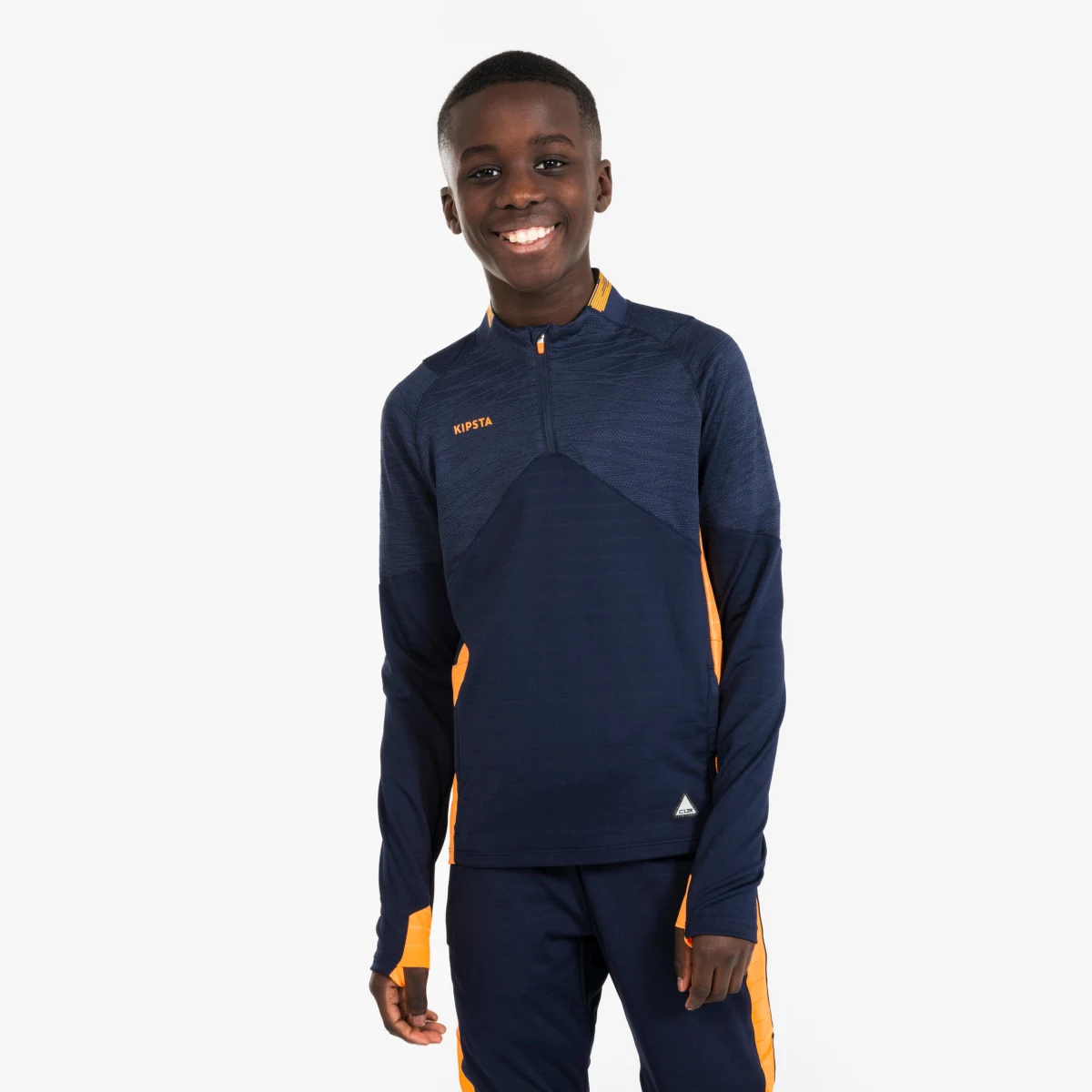KIPSTA Detská futbalová mikina CLR 1/2 zips modro-oranžová 10-11 r (141-150 cm) · záber 1