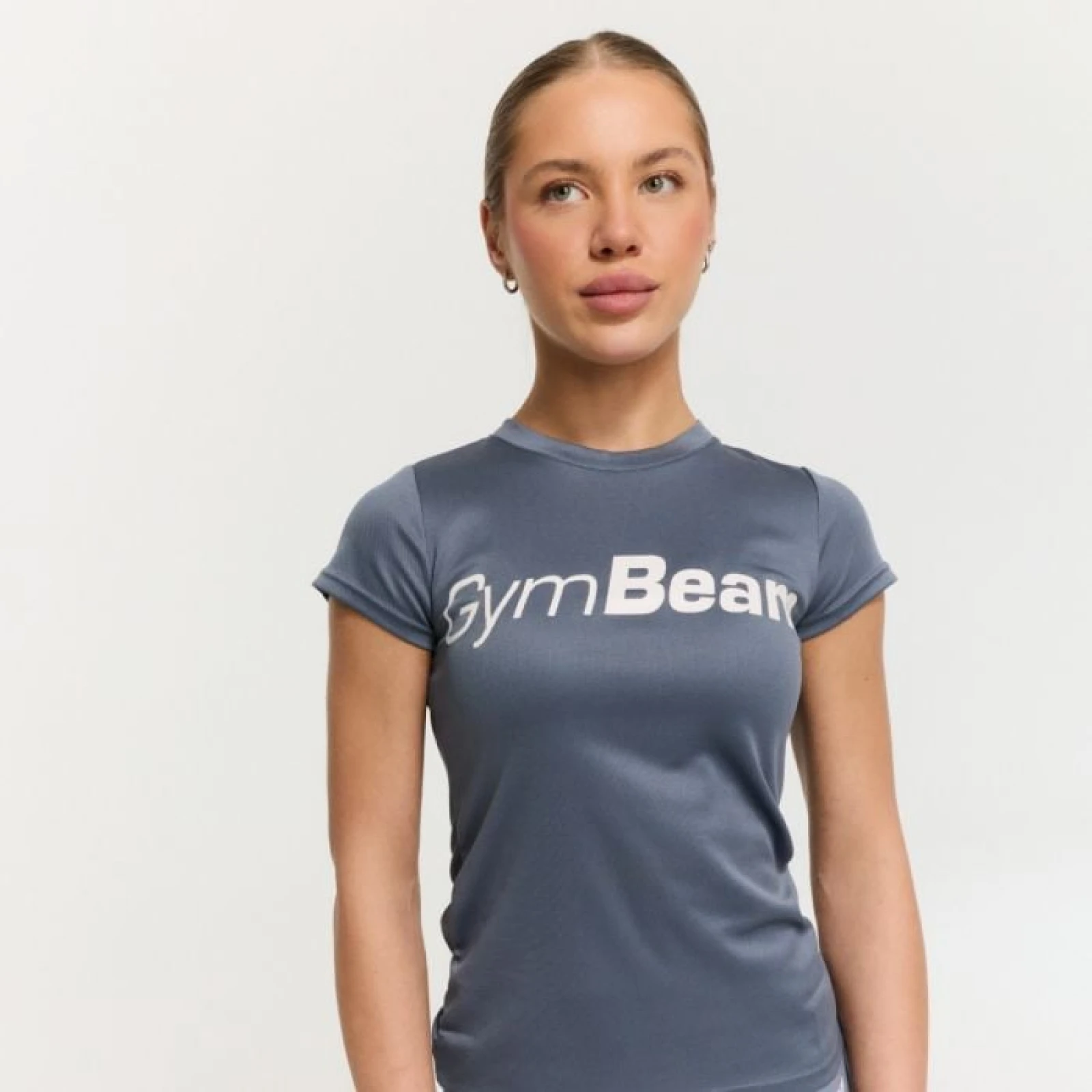 Дамска тениска Mesh Essence Denim Blue – GymBeam - Размер: XS | Тегло: 0,0967 g | Опаковка: 100 · záber 1