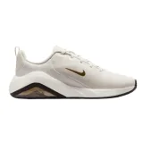 Dámská sportovní obuv (tréninková) NIKE Bella 7 W phantom metallic gold black sail · záber 1