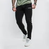 Tepláky Slimfit Black - GymBeam - Velikost: S | Barva: čierna · záber 1