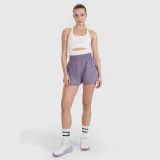 Dámské sportovní rychleschnoucí šortky 4F x Anna Lewandowska - fialové · záber 1