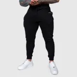 Pánske športové tepláky Iron Aesthetics Flexi, čierne · záber 3